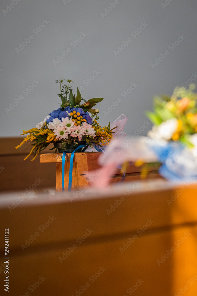 Flowers and other wedding decoration in a church