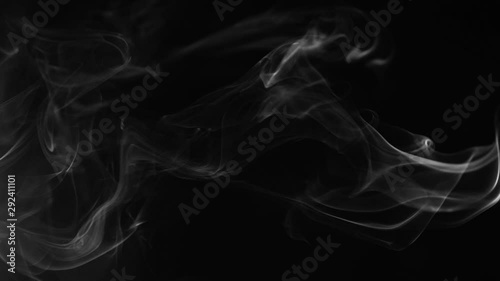 swirling white smoke on a black background