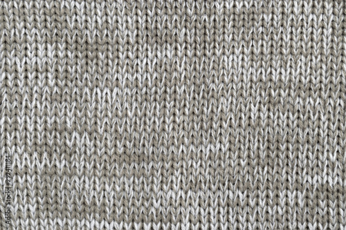 White and light brown melange yarn fabric knitted texture background