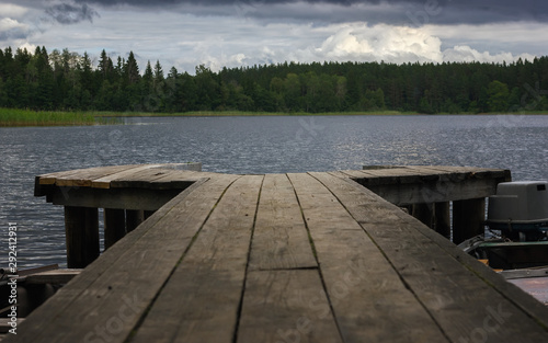 View Of The Forest Lake From A Wooden Pier