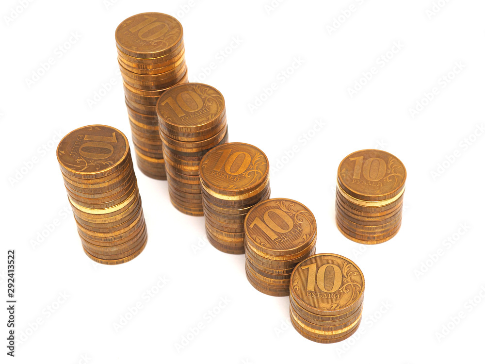 Interest symbol composed of columns of Russian 10-ruble coins on a white background. Not isolated. Macro Interest symbol composed of columns of Russian 10-ruble coins on a white background. Not isolated. Macro