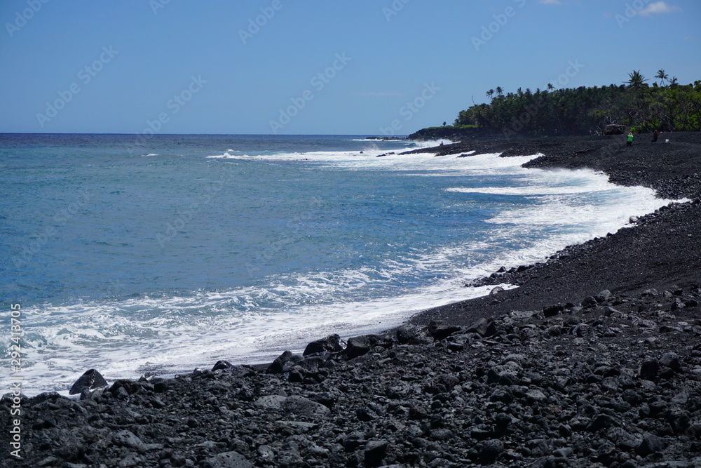 One of the newest beaches in the world - new black sand at Pohoiki Beach in Isaac Hale Park in Hawaii was created after the 2018 eruptions of Kilauea Volcano.