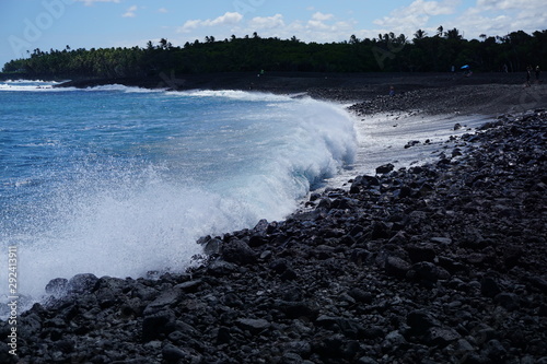 One of the newest beaches in the world - new black sand at Pohoiki Beach in Isaac Hale Park in Hawaii was created after the 2018 eruptions of Kilauea Volcano. photo