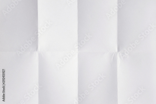 Blank white sheet of paper folded 3 times