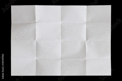 Blank white sheet of paper folded 4 times isolated on black background