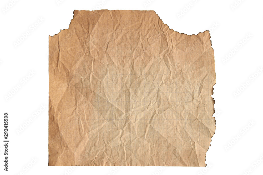 Weathered notebook tear grid sheet with burned edges isolated on white background. Burnt piece of old brown paper. Copy space. Closeup Weathered notebook tear grid sheet with burned edges isolated on white background. Burnt piece of old brown paper. Copy space. Closeup