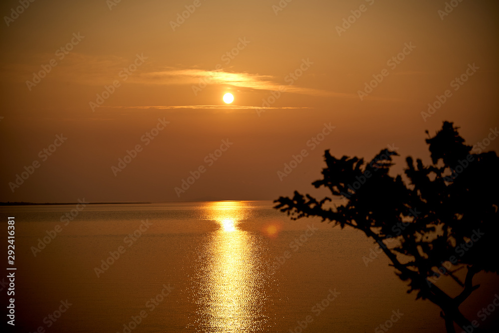 Sunrise about lake Baikal in the summer