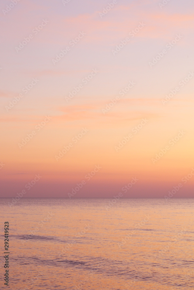 beautiful evening on the beach with gradient sky