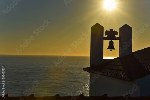 Sunset Silhouetted Church Steeple