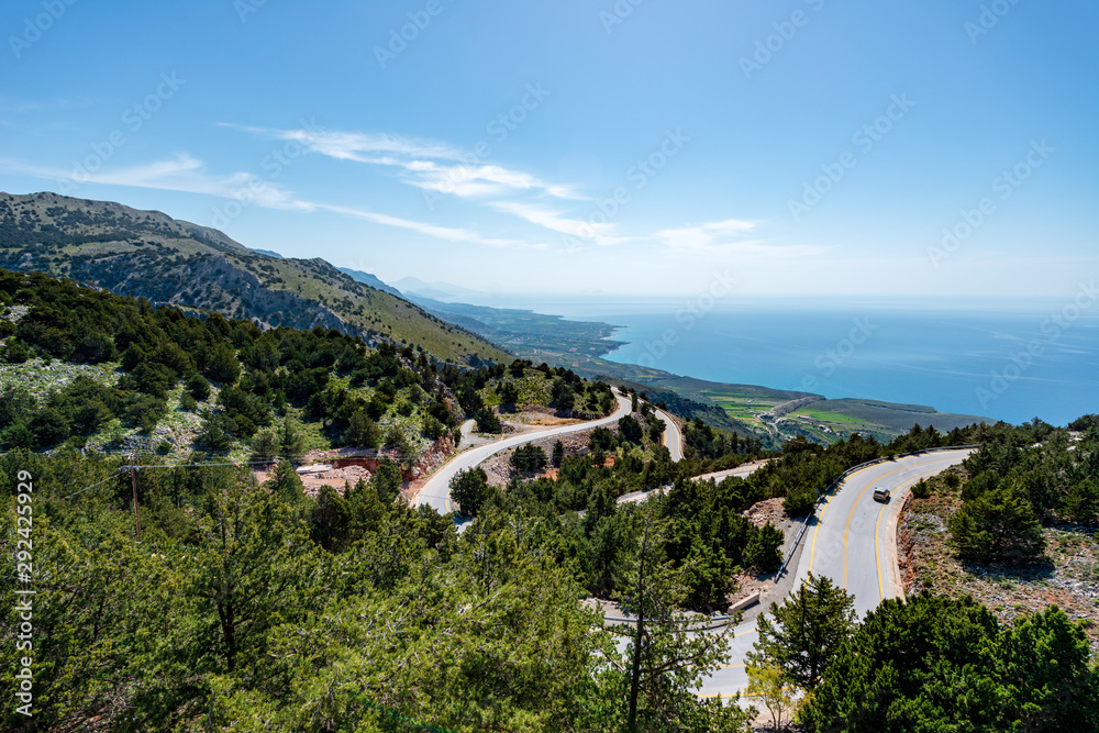 road in sunny mountains in greece