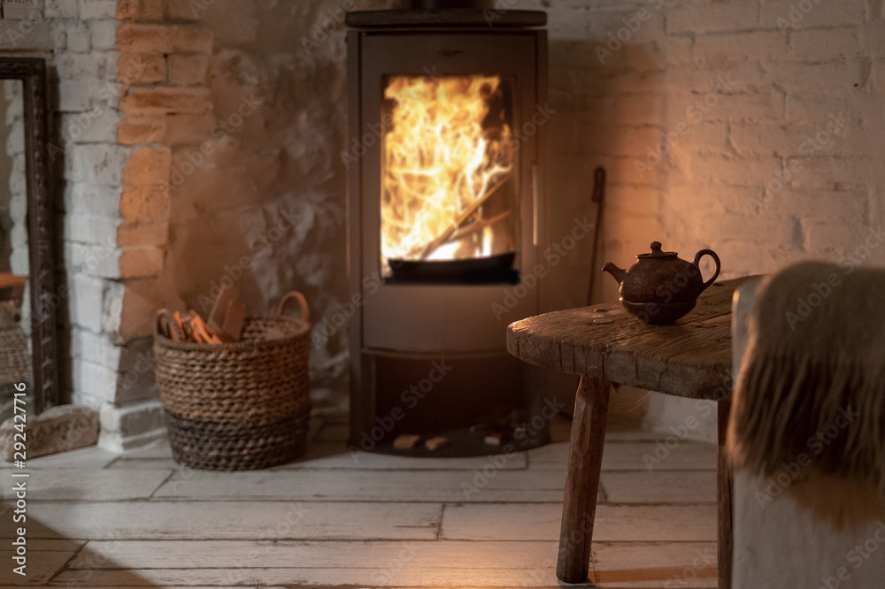 Wood stove fireplace in comfort cozy house Stock Photo | Adobe Stock