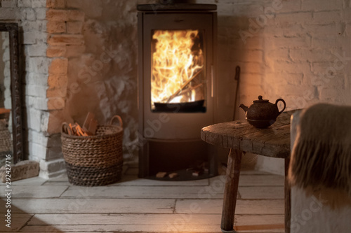 Fotografie, Tablou Wood stove fireplace in comfort cozy house