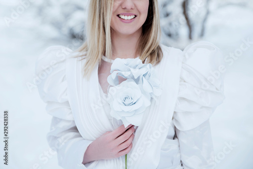 Beautiful woman holding bouguet photo