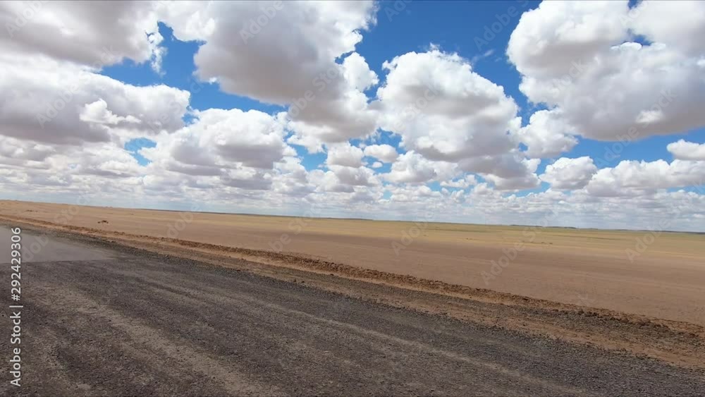Mongollian Road, long distance view with no civilization - Gobi Desert, Mongolia Mongollian Road, long distance view with no civilization - Gobi Desert, Mongolia