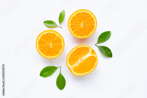 Fresh orange citrus fruit with leaves isolated on white background.