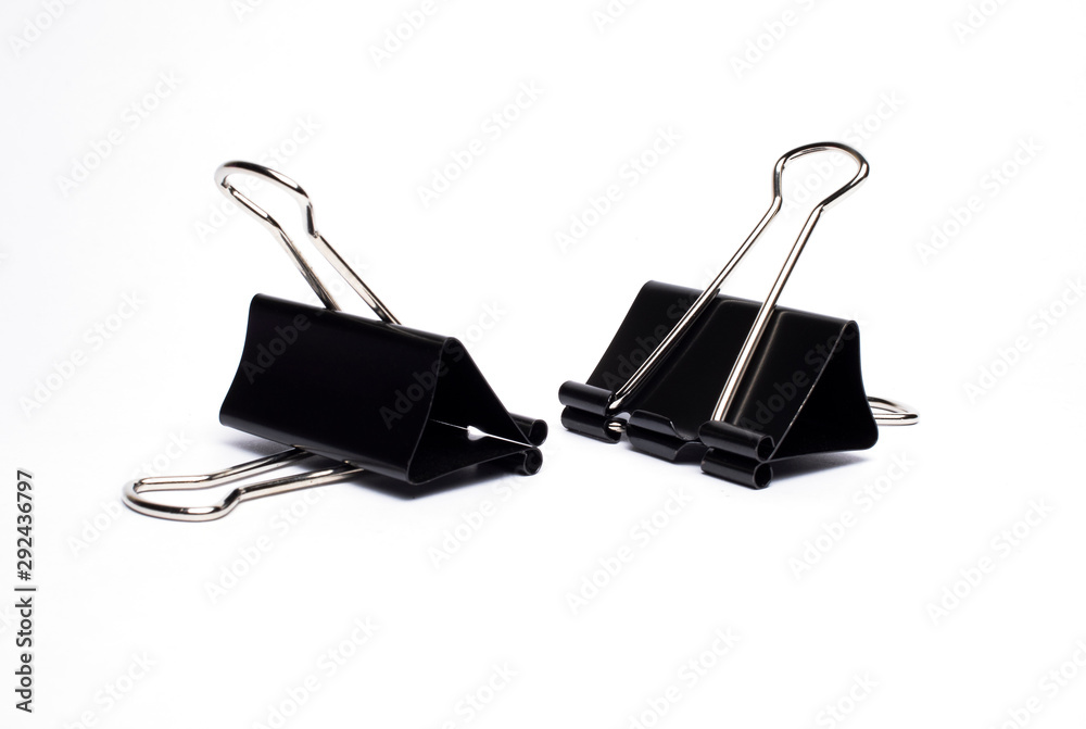 A black paper clip on a white background A black paper clip on a white background