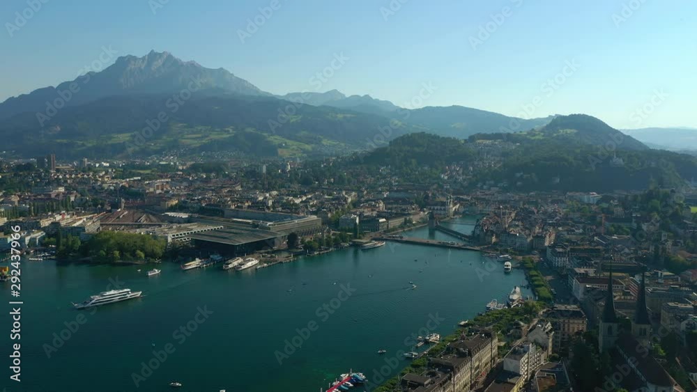 sunny evening flight over luzern cityscape train station lakeside bridge bay aerial panorama 4k switzerland sunny evening flight over luzern cityscape train station lakeside bridge bay aerial panorama 4k switzerland
