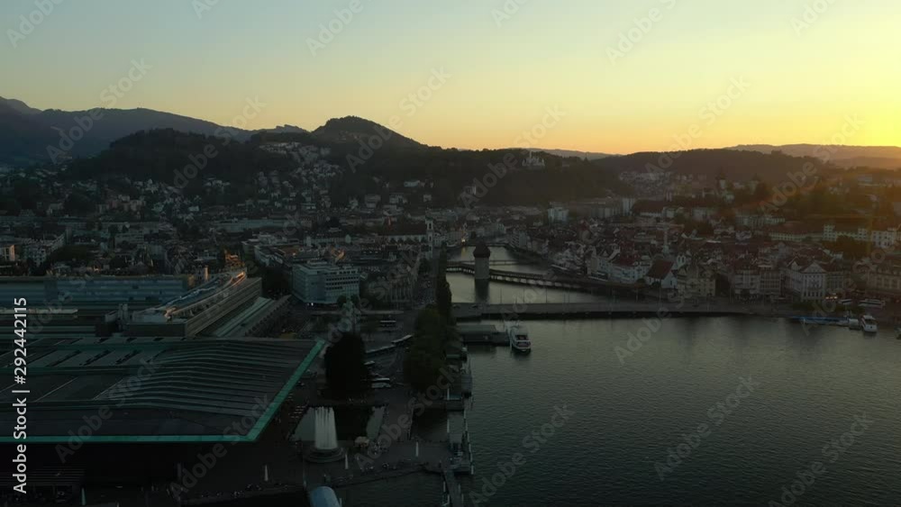 luzern city sunset time lakeside bay dock train station modern museum aerial panorama 4k switzerland luzern city sunset time lakeside bay dock train station modern museum aerial panorama 4k switzerland