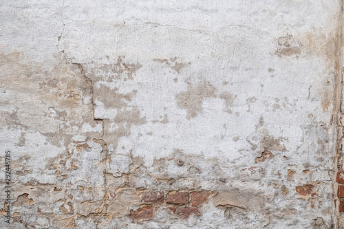 texture of old cracked, rustic plastered brick wall