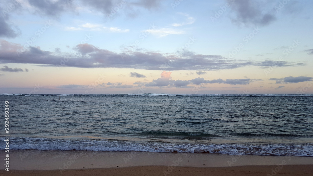 Sandy shoreline of Kahala Beach and Pacific Ocean