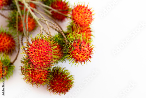 opened rambutan fruit or hairy fruit on white background.