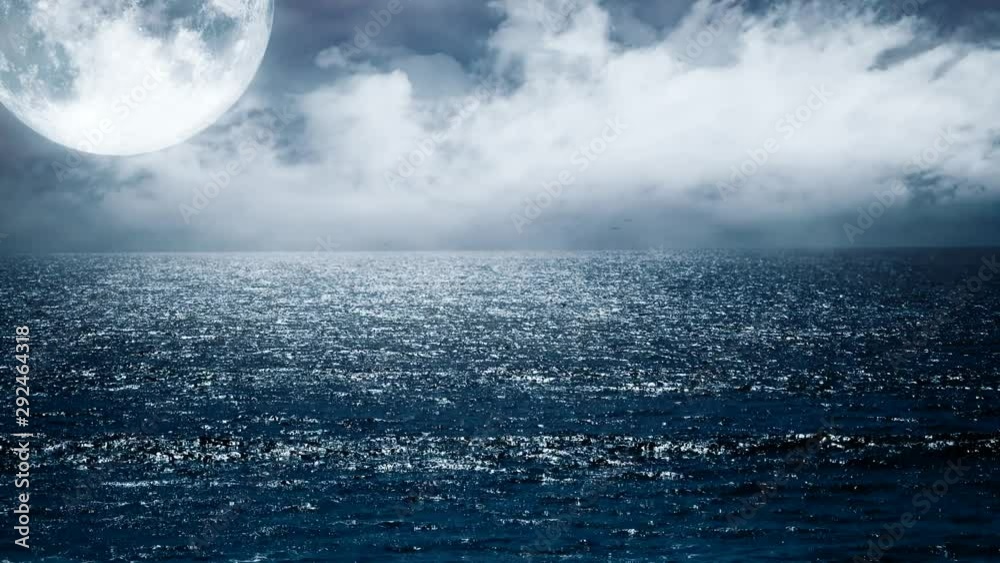 Looped night view of sea waves and blue sky with clouds and moon