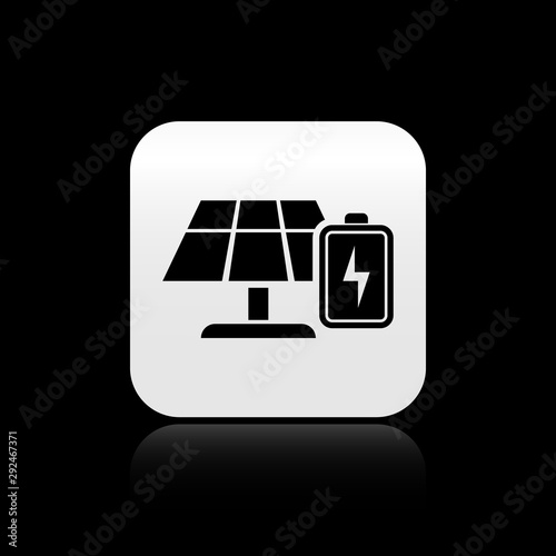 Black Solar energy panel and battery icon isolated on black background. Silver square button. Vector Illustration