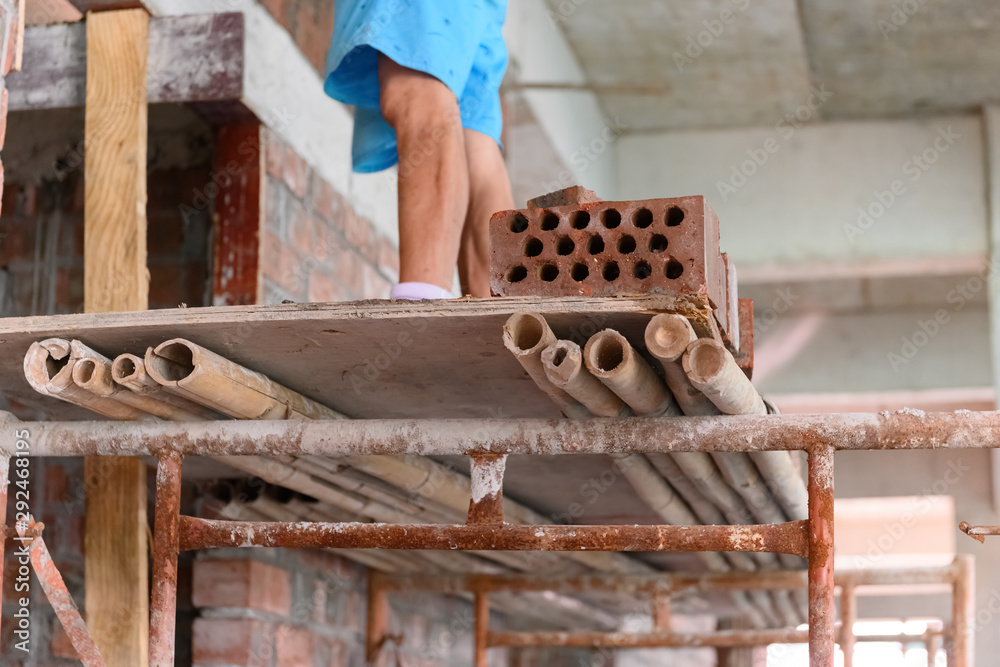 plasterer making up a brick wall plasterer making up a brick wall