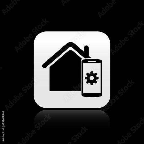 Black Smart home - remote control system icon isolated on black background. Silver square button. Vector Illustration