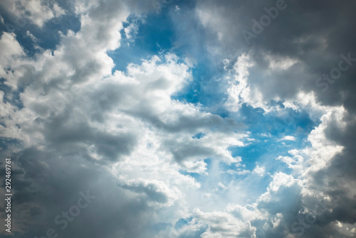 Storm clouds on a background of blue sky.