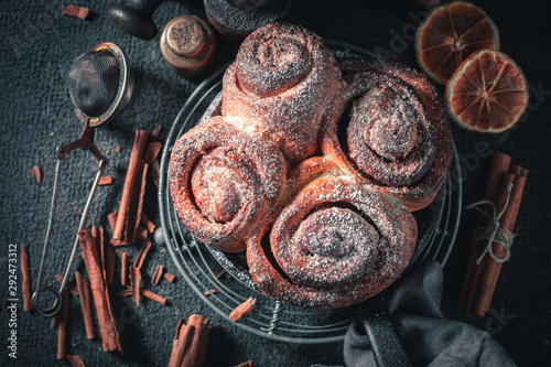 Freshly baked cinnamon buns as swedish christmas dessert.