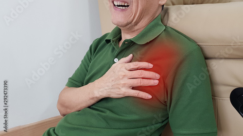 Obraz na plátne Old man has chest pain and painful facial expression