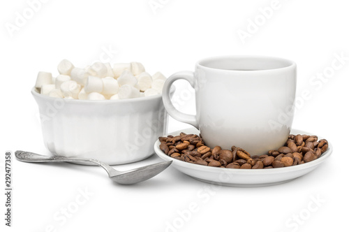 Cup of coffee with coffe beans and marshmallows on white.