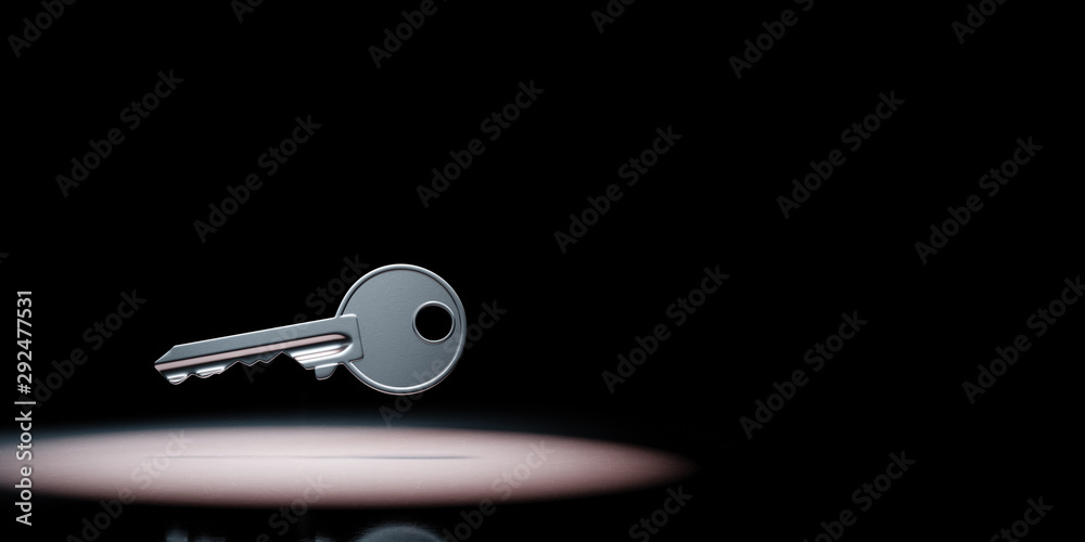 Key Spotlighted on Black Background Key Spotlighted on Black Background