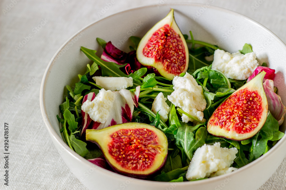 Salad with figs, cheese and honey. Healthy eating.