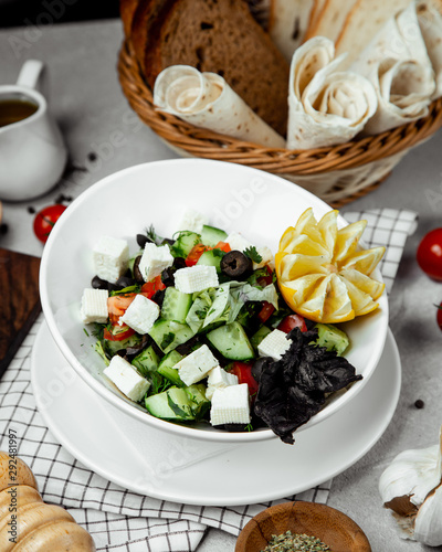 Shepherd salad topped with cheese