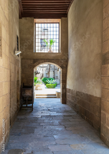 Stone bricks passage leading to the courtyard of historic Beit El Sehemy house, Cairo, Egypt photo