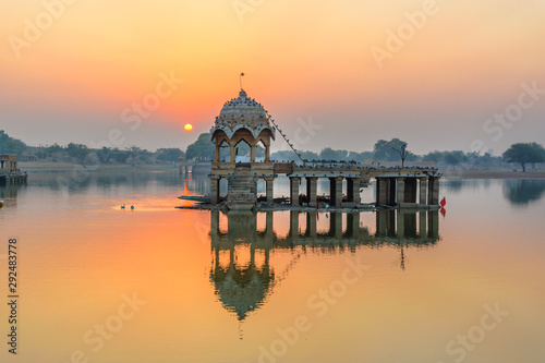 Gadisar lake in the morning at sunrise. Man-made water reservoir with temples in Jaisalmer. India