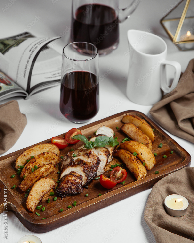 Fried potato and meat slices with herbs