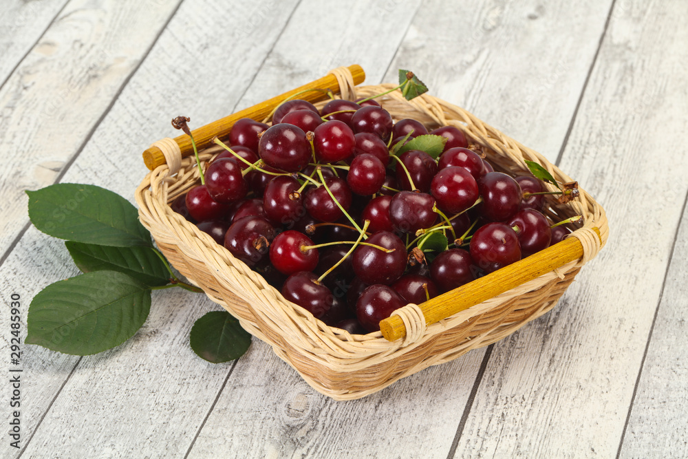 Sweet ripe cherry with leaves