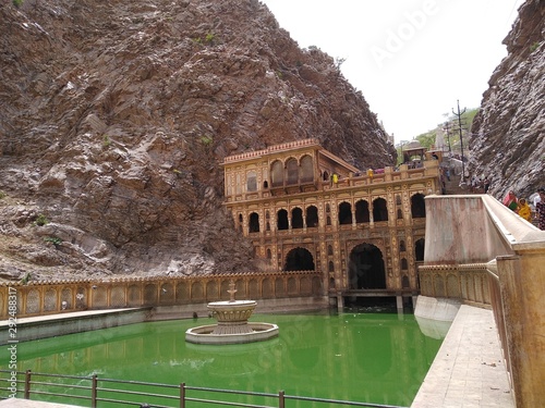 Jaipur,Rajasthan/India- September 25 2019: Monkey temple of india. Galtaji temple with green water pond.