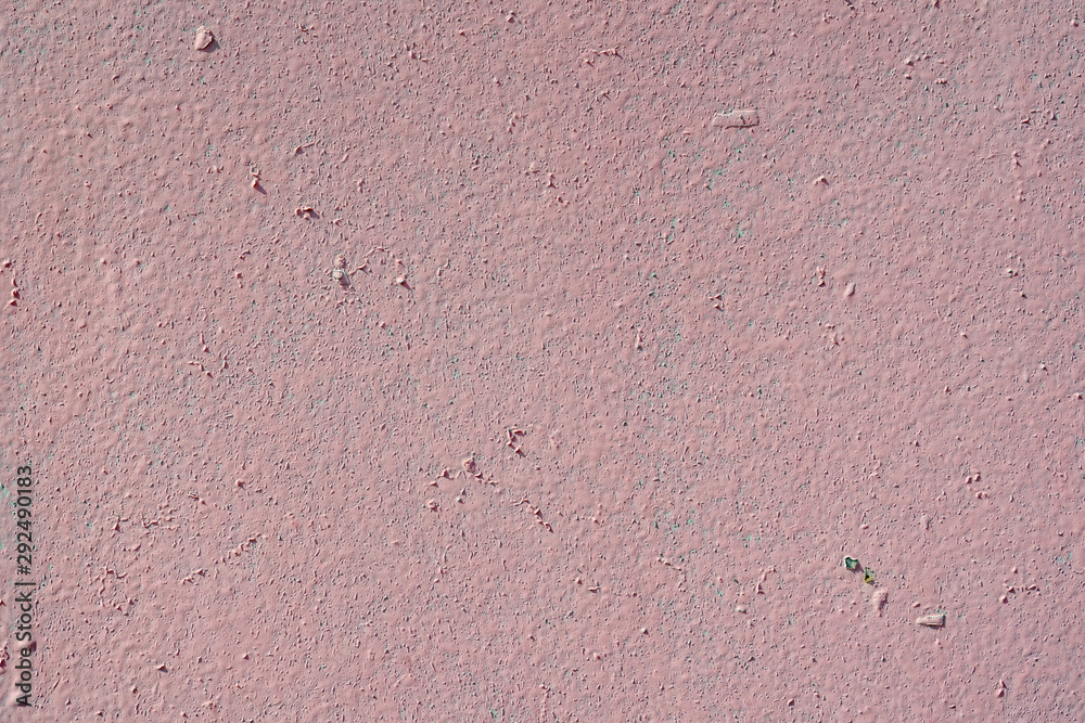 Old pink wall with flecks of dried paint. Pink texture and background Old pink wall with flecks of dried paint. Pink texture and background