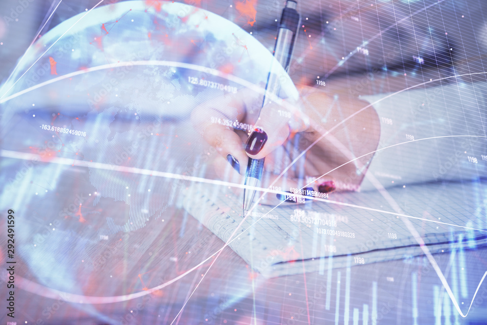 Multi exposure of hands making notes with forex chart huds. Stock market concept. Multi exposure of hands making notes with forex chart huds. Stock market concept.