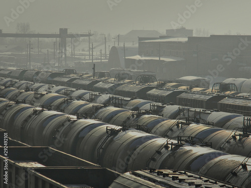 Railroad tank tanks side view. Smog city © Илья Антохин