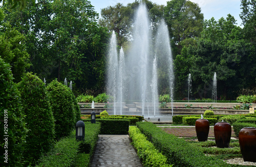 Fountain in the park And fresh atmosphere Surrounded by beautiful green trees