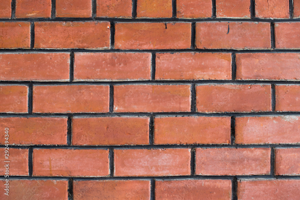 Fototapeta premium Red yellow bricks wall texture background