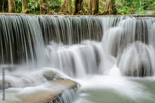 Travel to the beautiful waterfall in tropical rain forest  soft water of the stream in the natural park at Huai Mae Khamin Waterfall in Kanchanaburi  Thailand.