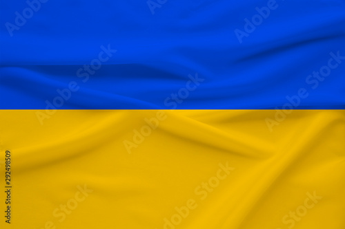 national flag of Ukraine on gentle silk with wind folds  travel concept  immigration  politics