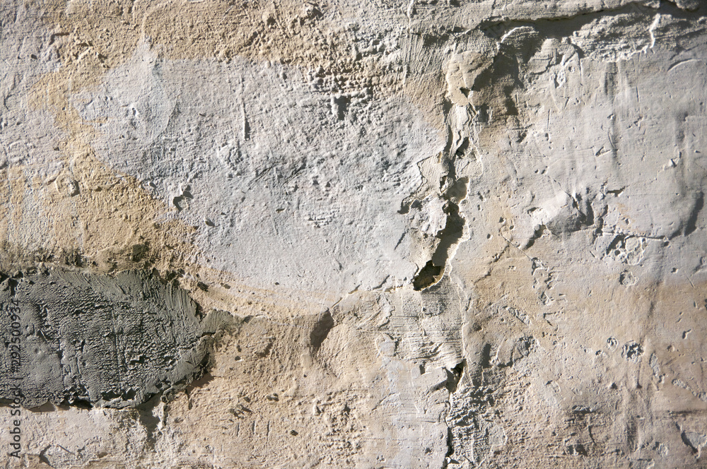 Fototapeta premium Distressed weathered rouge plaster texture