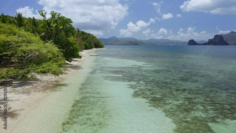 4k Aerial drone fly along tropical exotic beach in El Nido, Palawan, Philippines. Summer and travel vacation concept 4k Aerial drone fly along tropical exotic beach in El Nido, Palawan, Philippines. Summer and travel vacation concept